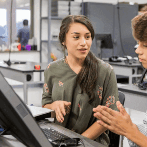 Students collaborating in a computer lab.