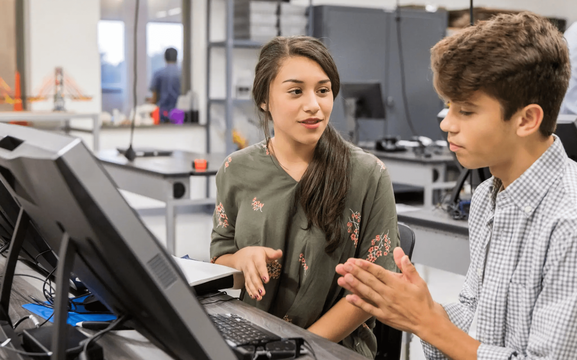 Students collaborating in a computer lab.