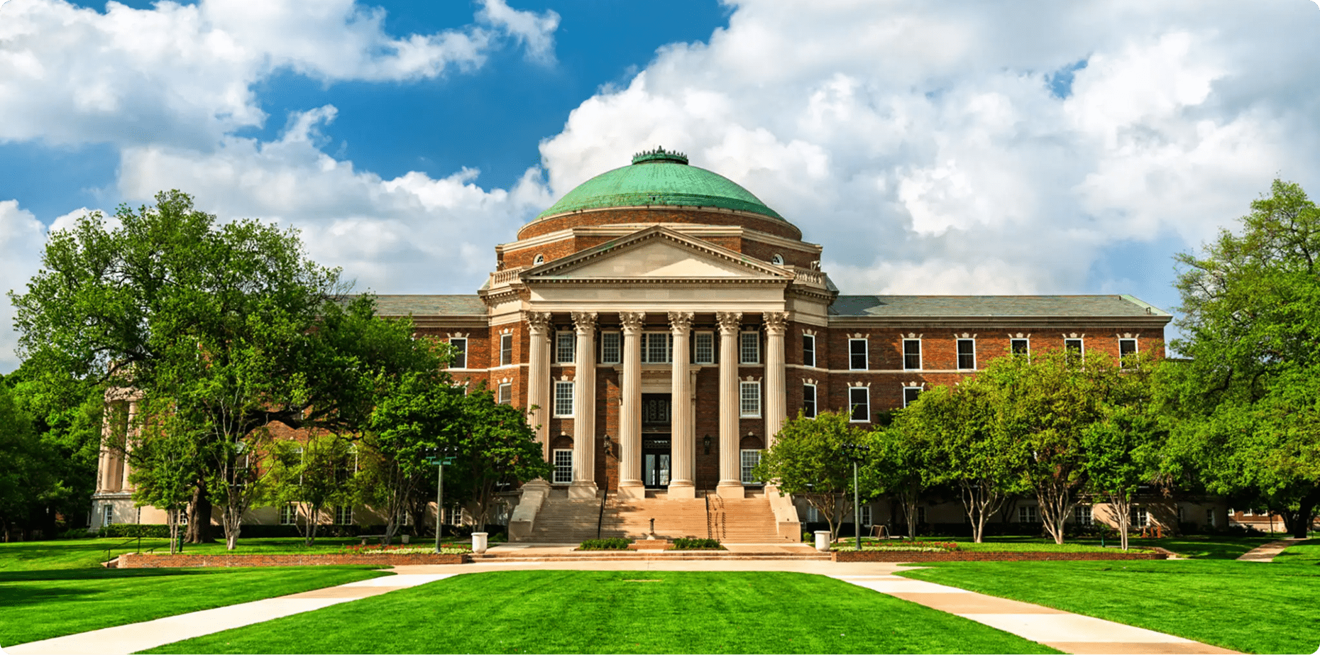 Historic building with dome and columns, daytime.